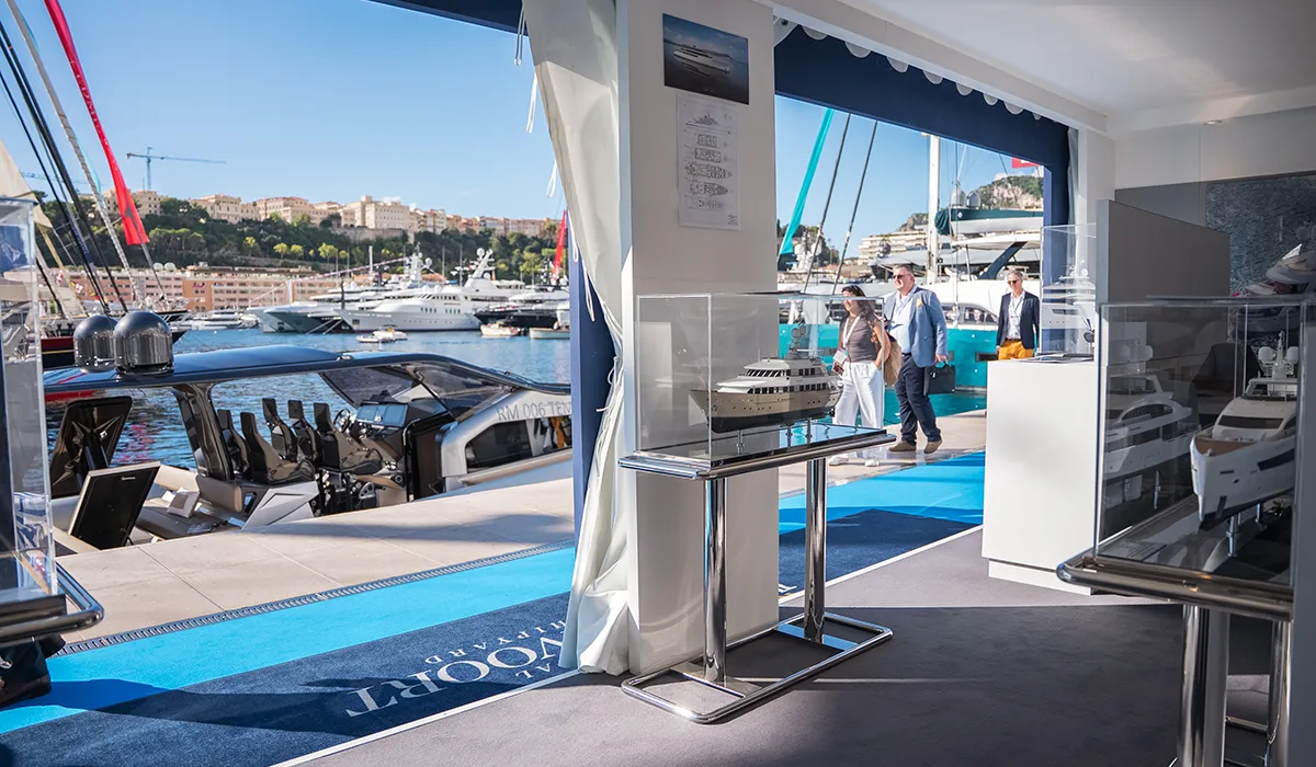 View from the Royal Hakvoort Shipyard exhibition stand over the harbour at Monaco Yacht Show 2025