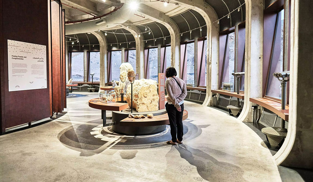 Visitor experiencing Jebel Buhais museum, realised by Hypsos
