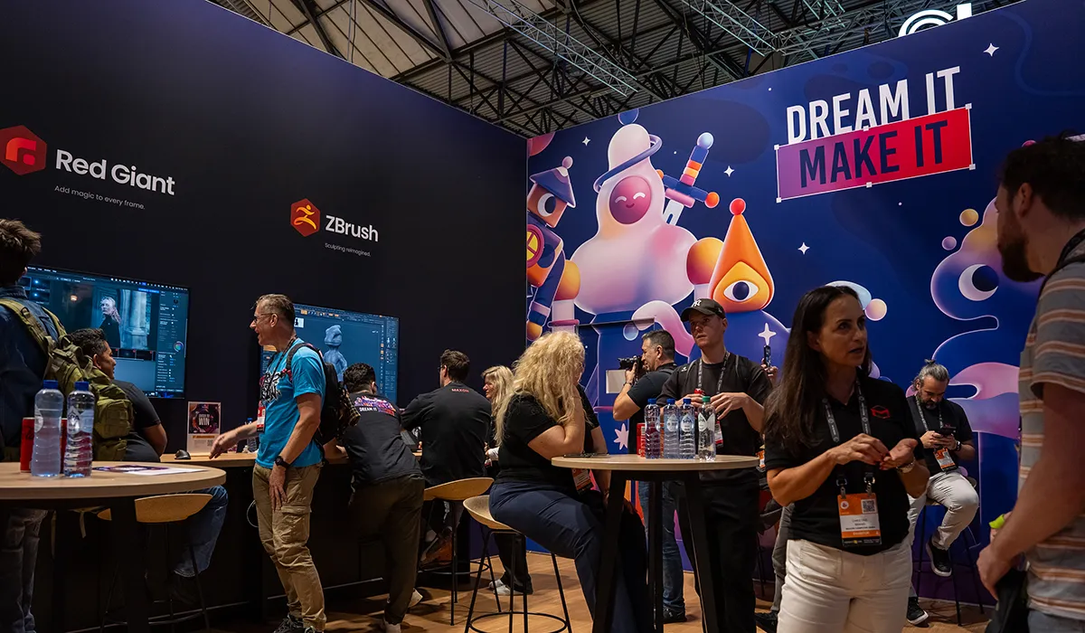 Visitors experiencing the Maxon exhibition stand at IBC 2025, realised by Hypsos