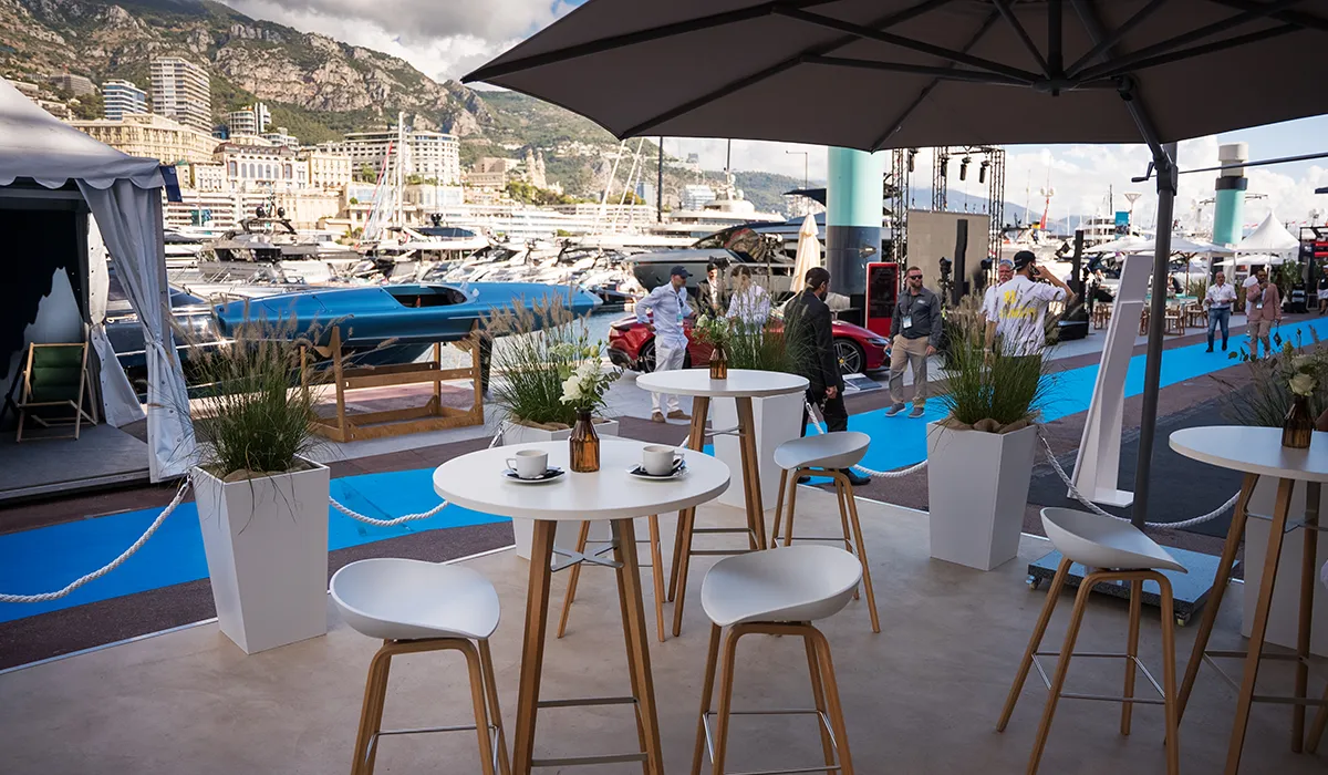 View from the QFZ exhibition stand over the harbour at Monaco Yacht Show 2025, realised by Hypsos