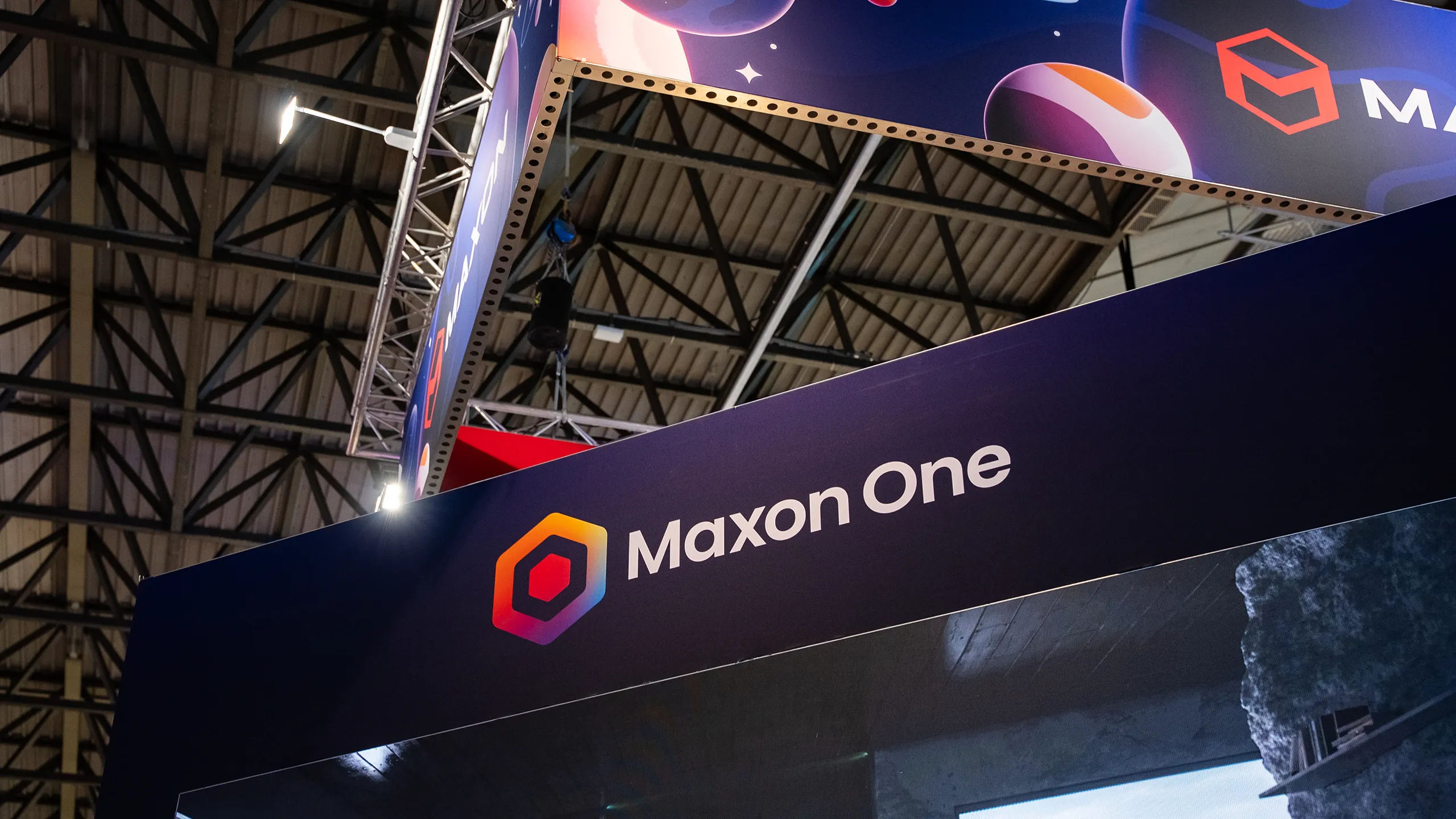 Close-up of branded environment for Maxon at the IBC 2025 by Hypsos