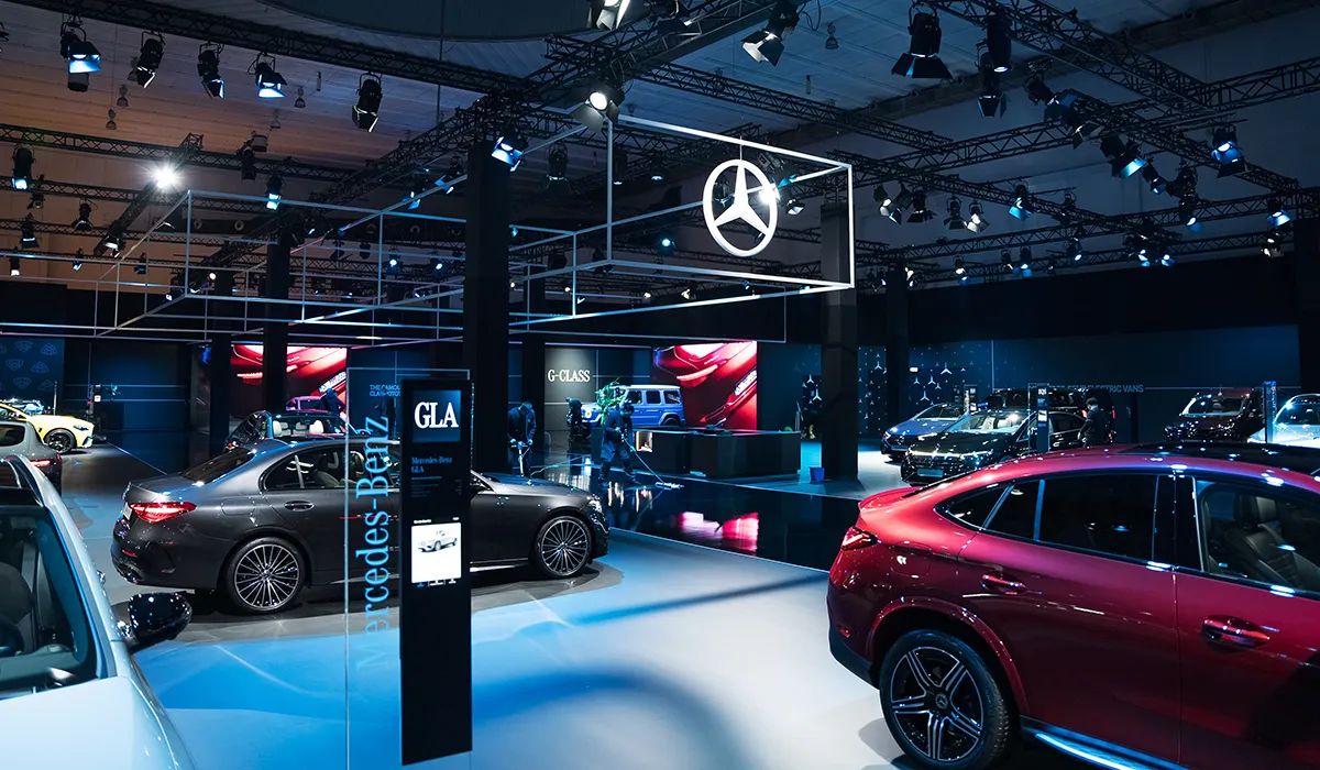 Wide view of the Mercedes-Benz exhibition presence at the Brussels Motor Show 2025, created by Hypsos